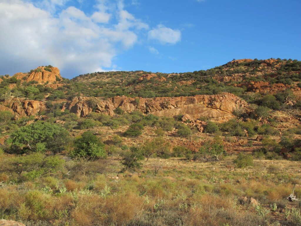 Rocky ridges and green bushveld on a bow hunting concession